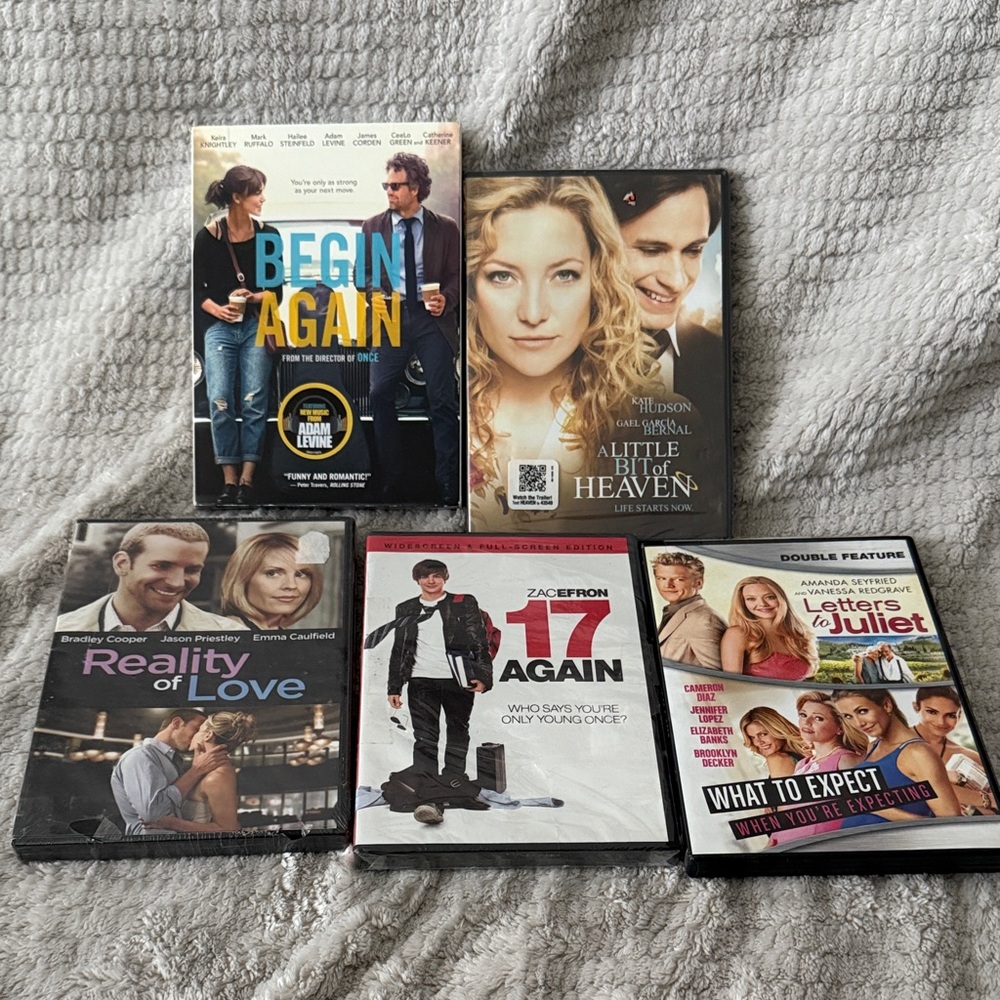 DVD Movie Collection 5 actual cd’s, one has 2 movies on it